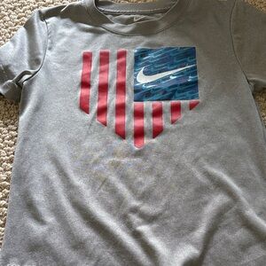 Nike Kids Gray Tee with Red Stripes and Blue Graphic